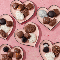 Heart-shaped red tin chocolate gift from Bonnie & Pop