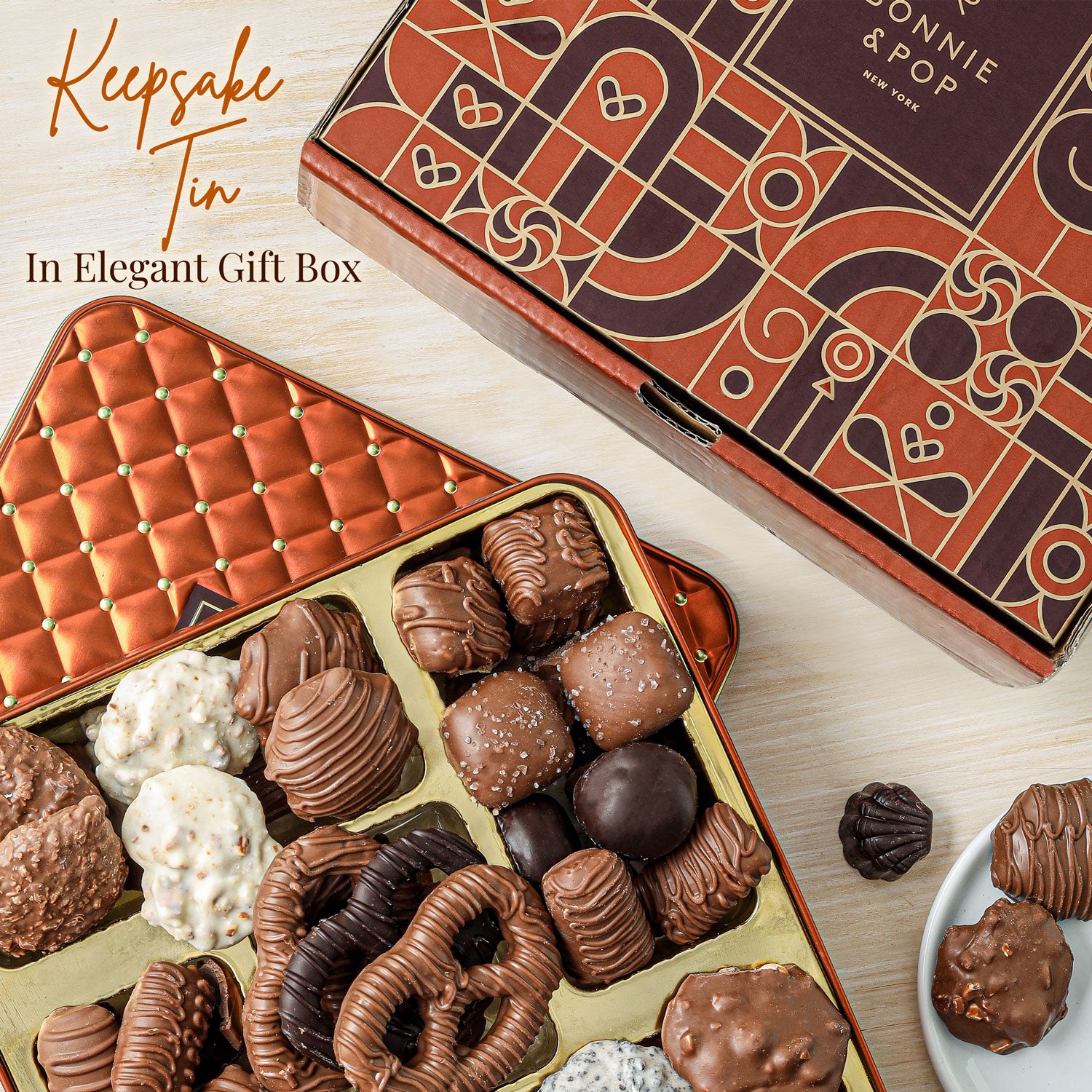 Bring holiday cheer with this Christmas chocolate gift box—a festive keepsake tin brimming with gourmet chocolates, caramels, and other seasonal delights.