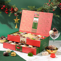 This Christmas Chocolate Truffle Gift Box open to reveal a variety of gourmet chocolate truffles inside. The box is red with green accents and has a decorative design.