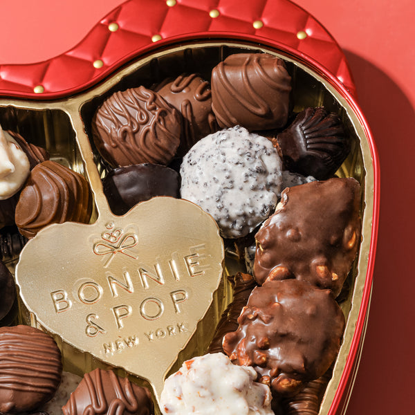 Heart-shaped red tin chocolate gift from Bonnie & Pop