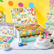 Make every birthday unforgettable. This three-tier birthday gift tower is packed with chocolates, cookies, nuts, and festive treats—beautifully wrapped and ready to wow.