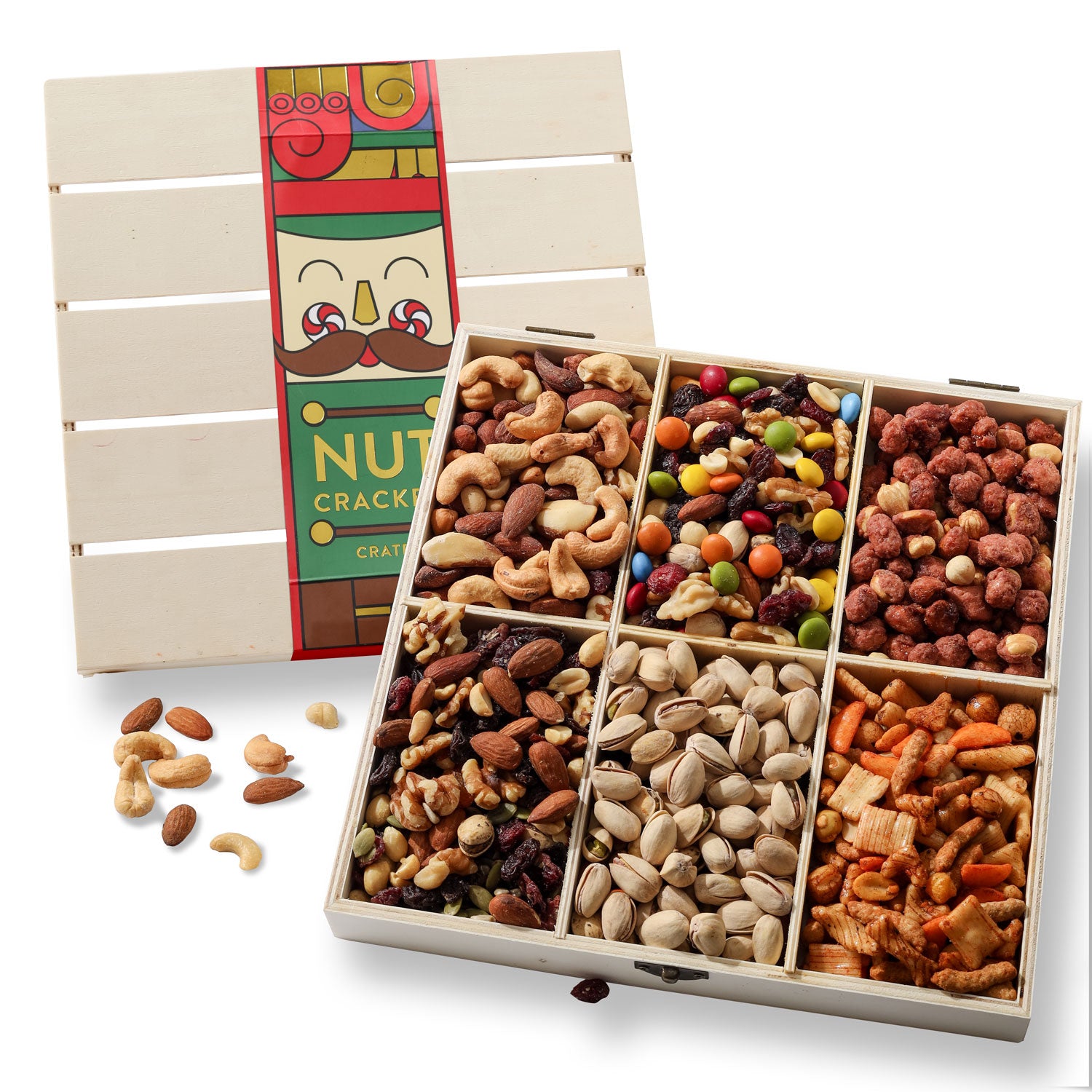 A wooden gift box containing various types of gourmet nuts in sections, with a festive Nutcracker holiday sleeve on the lid.
